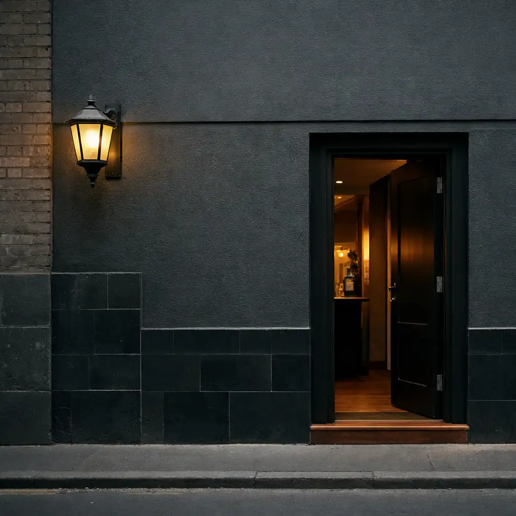 A quiet Melbourne lane venue doorway at early evening